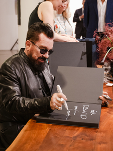 Peter Marino signing copies of Ten Modern Houses at Sotheby's photo Peter Zwolinski/BFA.com