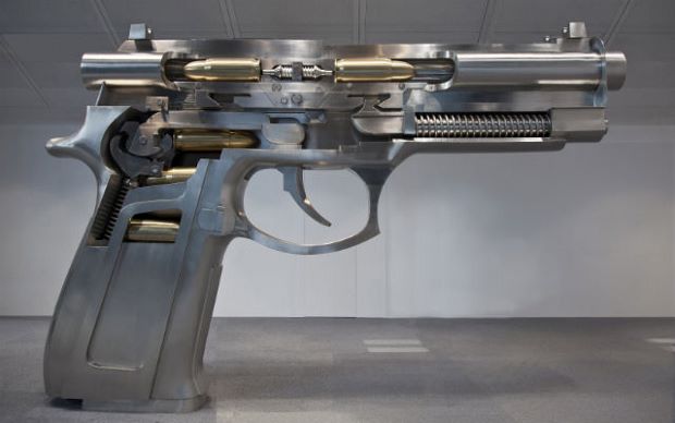 Fire at Both Ends Automatic Handgun (2013) by Wang Luyan