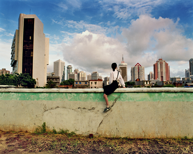 Sitting on the Wall: Haikou V (2001) by Weng Fen, from The Chinese Art Book